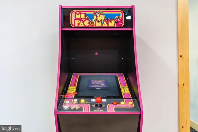 a front view of multiple houses with yard