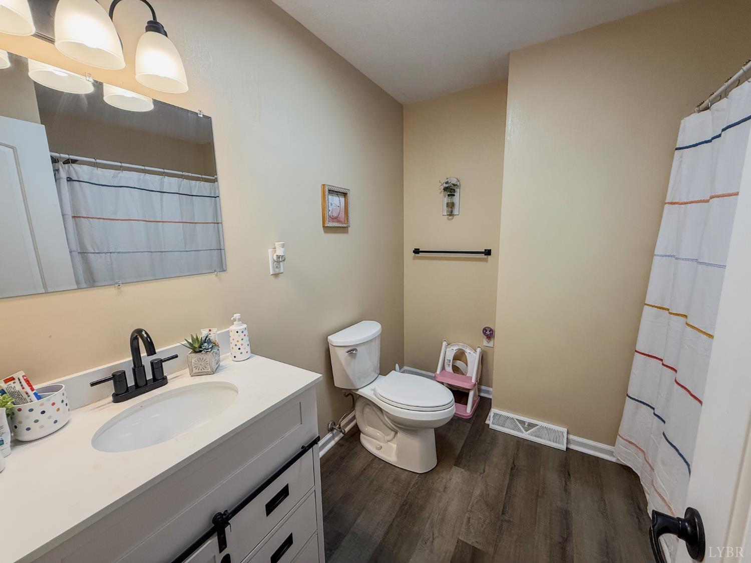 95 Midgett Farm Road Concord, VA 24538 - Photo 9 of 20 a bathroom with a sink and a toilet