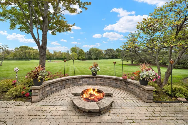 a view of a garden with a patio
