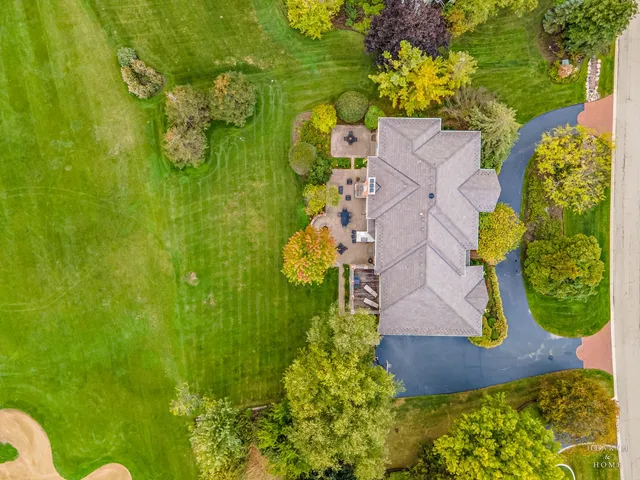 a room with window and pool view