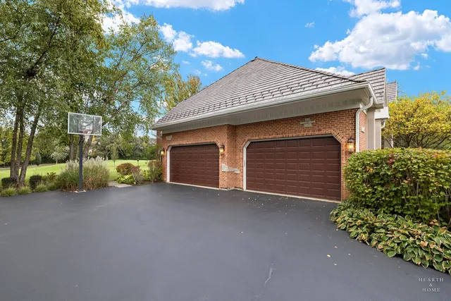 a front view of a house with a garage