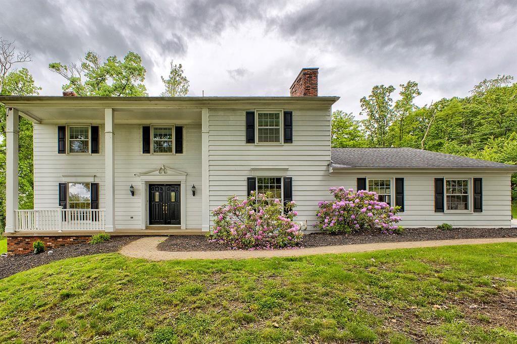 3222 Ridgeway Road Greensburg, PA 15601 - Photo 1 of 46 a front view of house with yard and outdoor seating