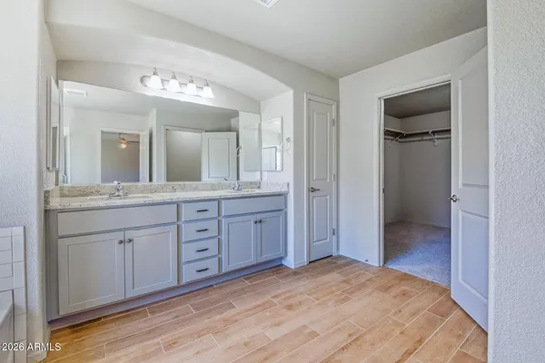 a view of an empty room with windows