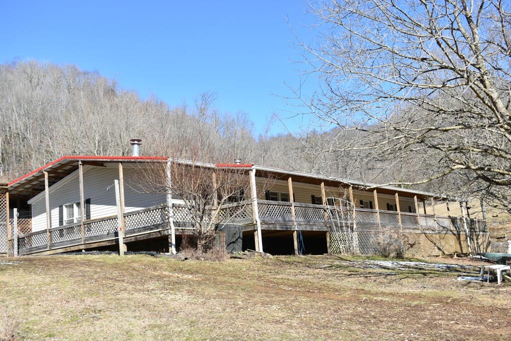 89 Dog Branch Road Pleasant Shade, TN 37145 - Photo 1 of 11 a view of a house with a yard