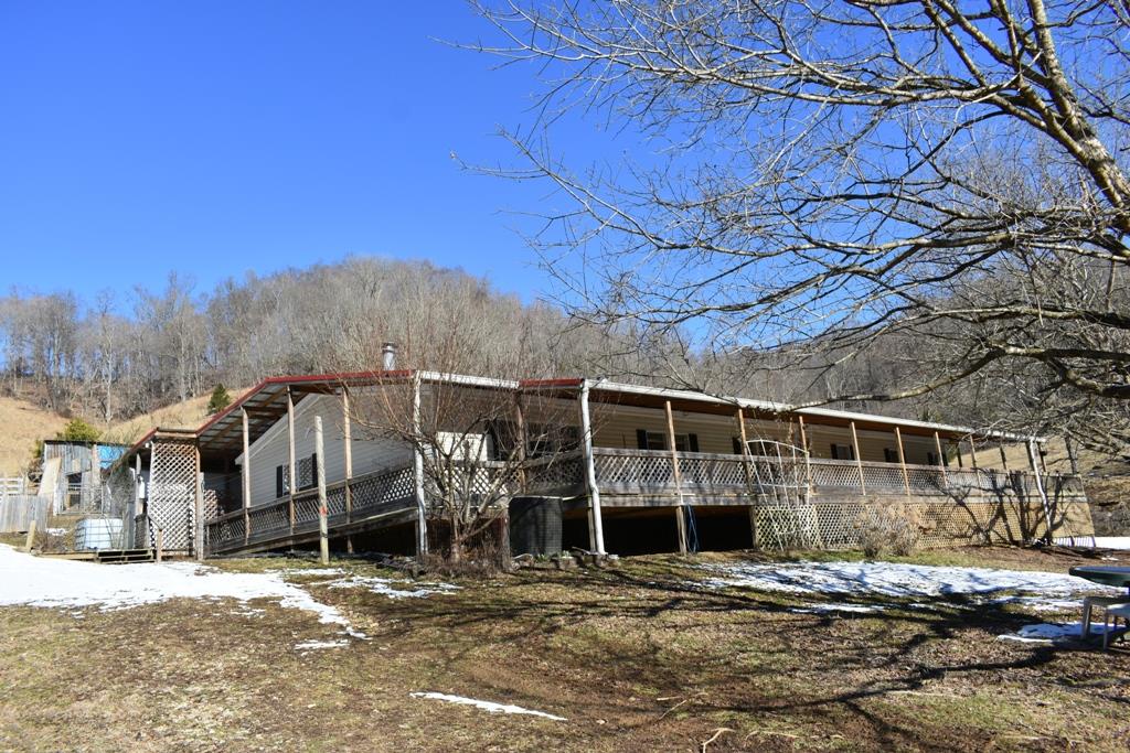 89 Dog Branch Road Pleasant Shade, TN 37145 - Photo 11 of 11 a view of a house with a snow in the background
