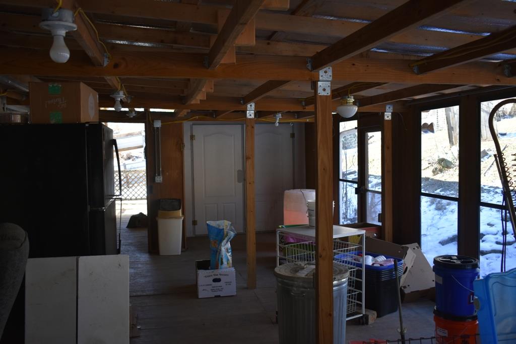 89 Dog Branch Road Pleasant Shade, TN 37145 - Photo 7 of 11 a room with lots of furniture and window