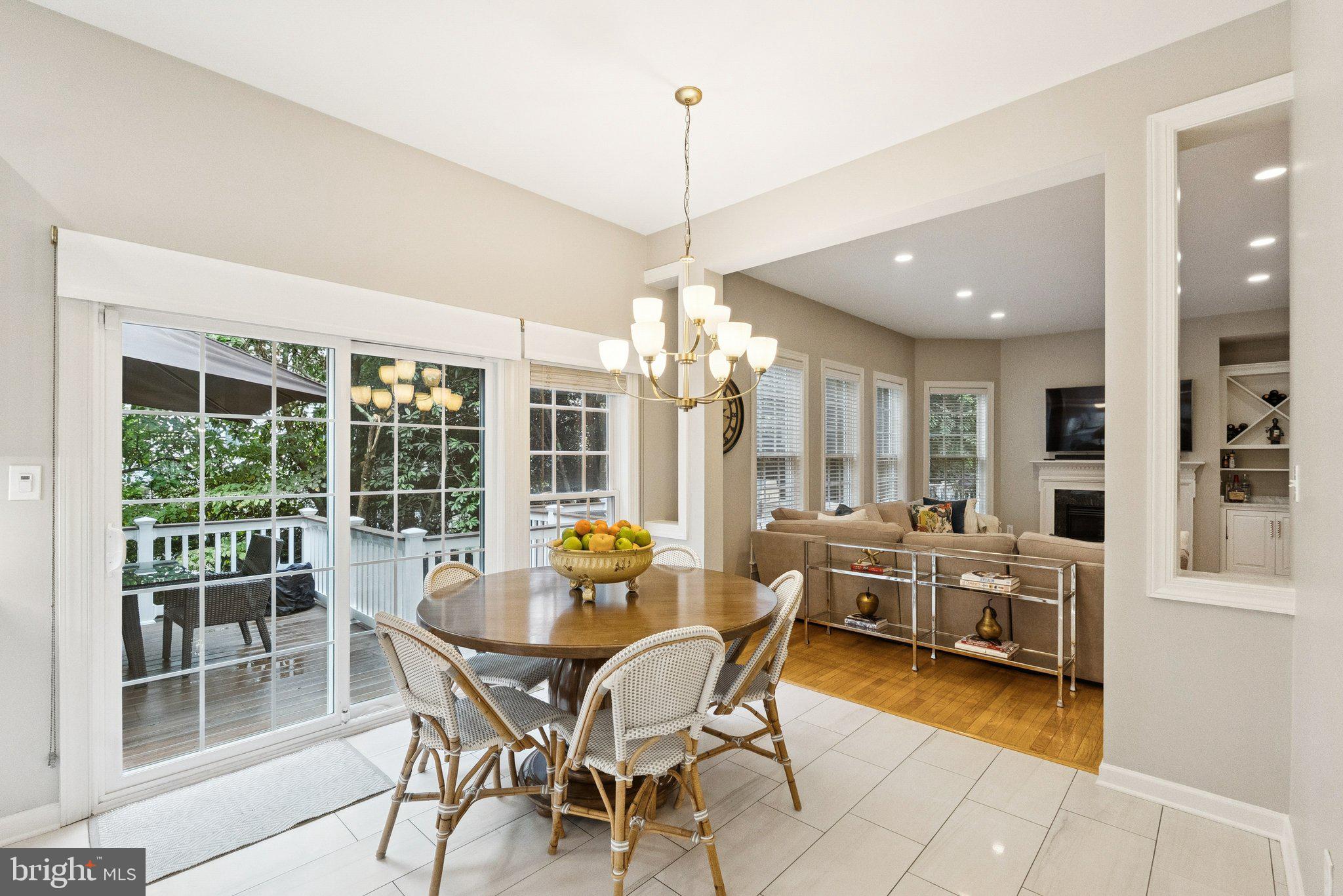 503 Autumn Wind Way Rockville, MD 20850 - Photo 14 of 83 a dining room with furniture a chandelier and wooden floor