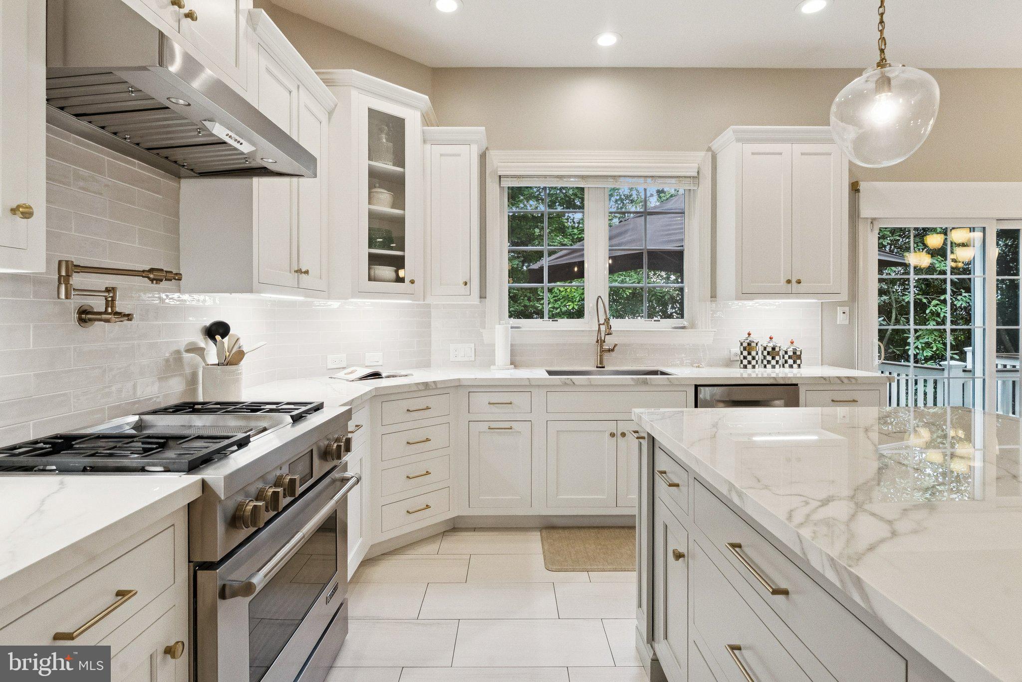 503 Autumn Wind Way Rockville, MD 20850 - Photo 21 of 83 a kitchen with stainless steel appliances granite countertop a sink stove and cabinets