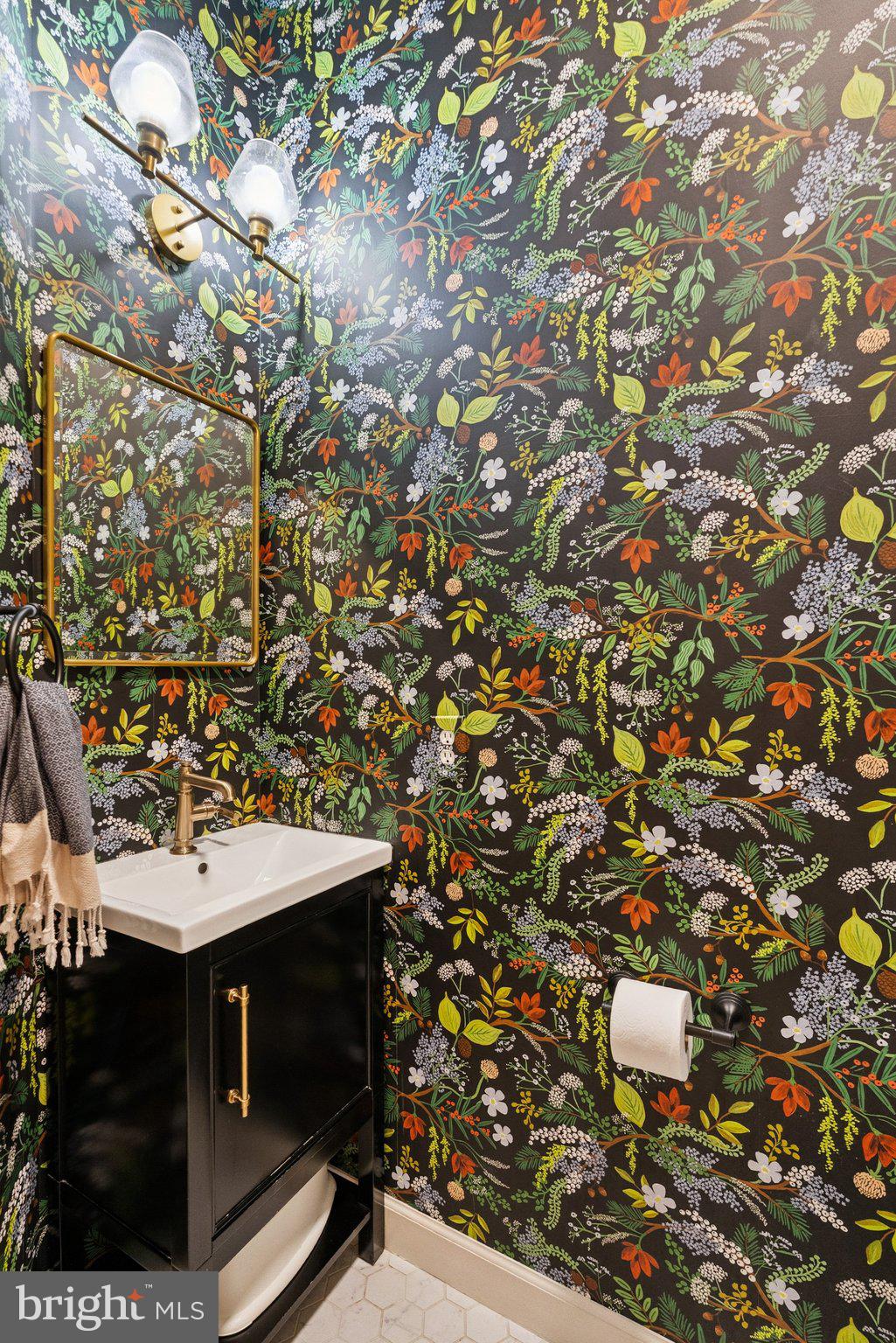 503 Autumn Wind Way Rockville, MD 20850 - Photo 24 of 83 a bathroom with a sink and mirror