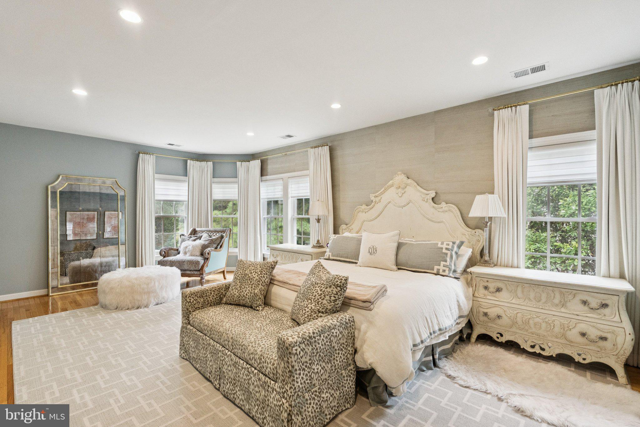 503 Autumn Wind Way Rockville, MD 20850 - Photo 30 of 83 a large bedroom with a bed and large windows