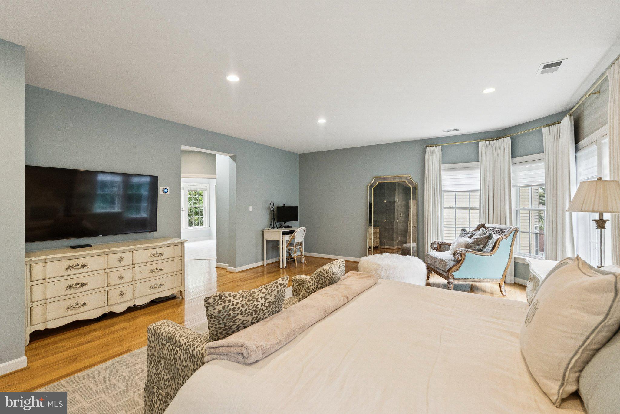 503 Autumn Wind Way Rockville, MD 20850 - Photo 32 of 83 a bedroom with a bed and a flat screen tv