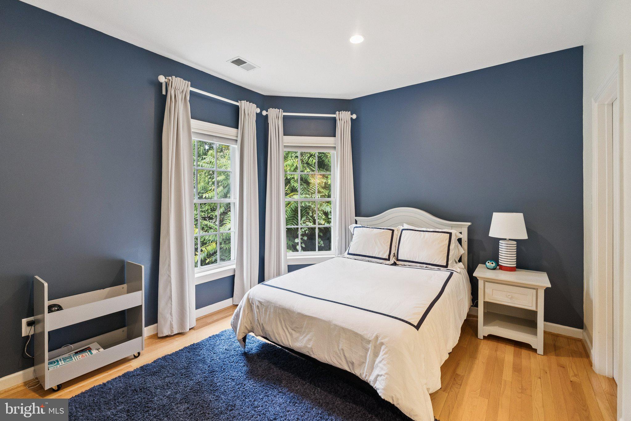 503 Autumn Wind Way Rockville, MD 20850 - Photo 44 of 83 a spacious bedroom with a bed and a window