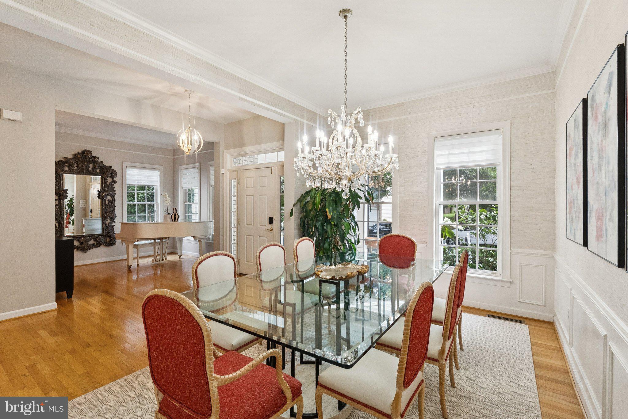 503 Autumn Wind Way Rockville, MD 20850 - Photo 5 of 83 a dining room with furniture a chandelier and wooden floor