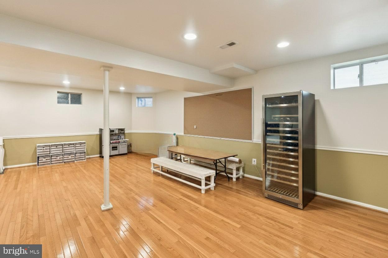 503 Autumn Wind Way Rockville, MD 20850 - Photo 52 of 83 a view of a livingroom with furniture and wooden floor