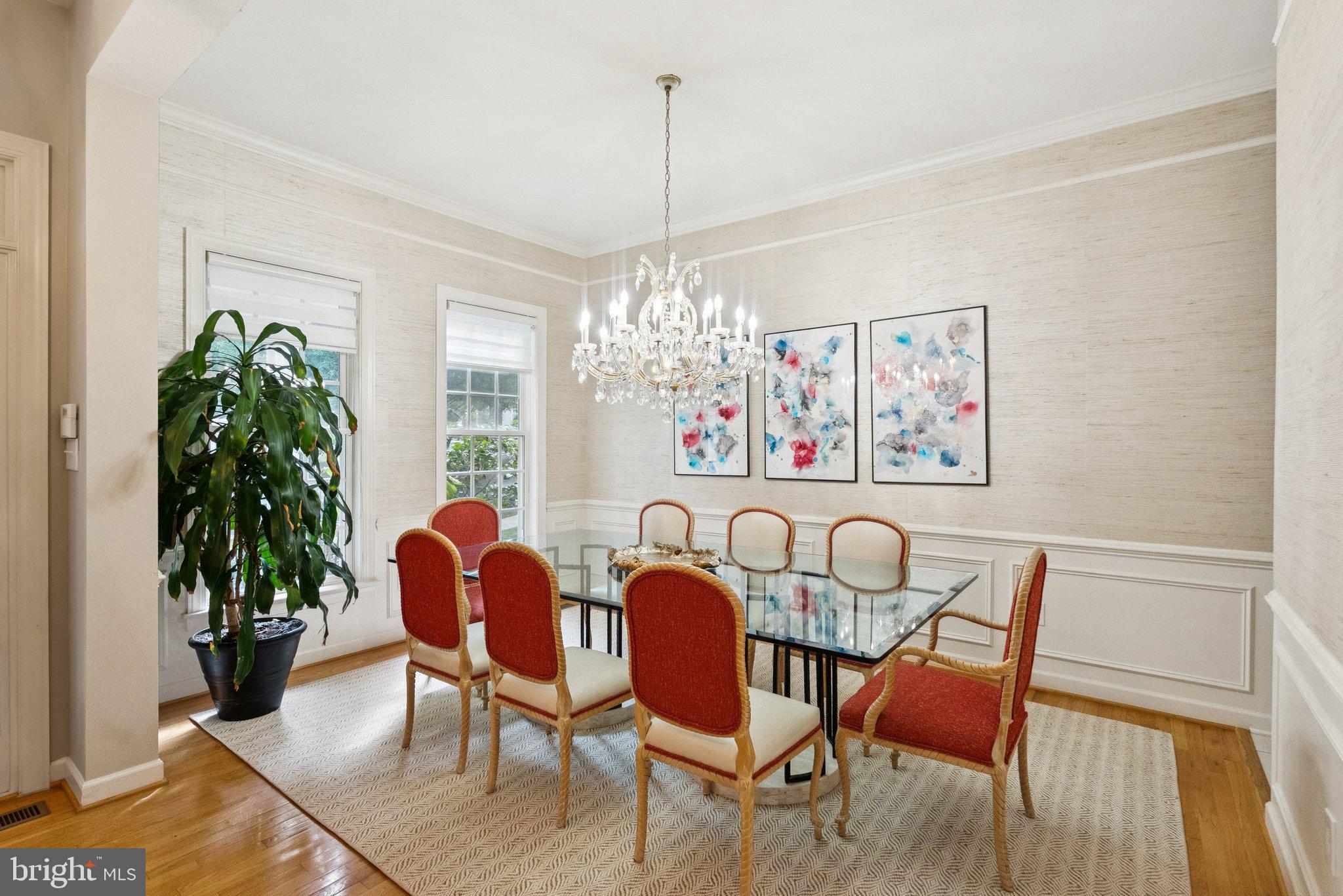503 Autumn Wind Way Rockville, MD 20850 - Photo 6 of 83 a dining room with furniture potted plants and wooden floor
