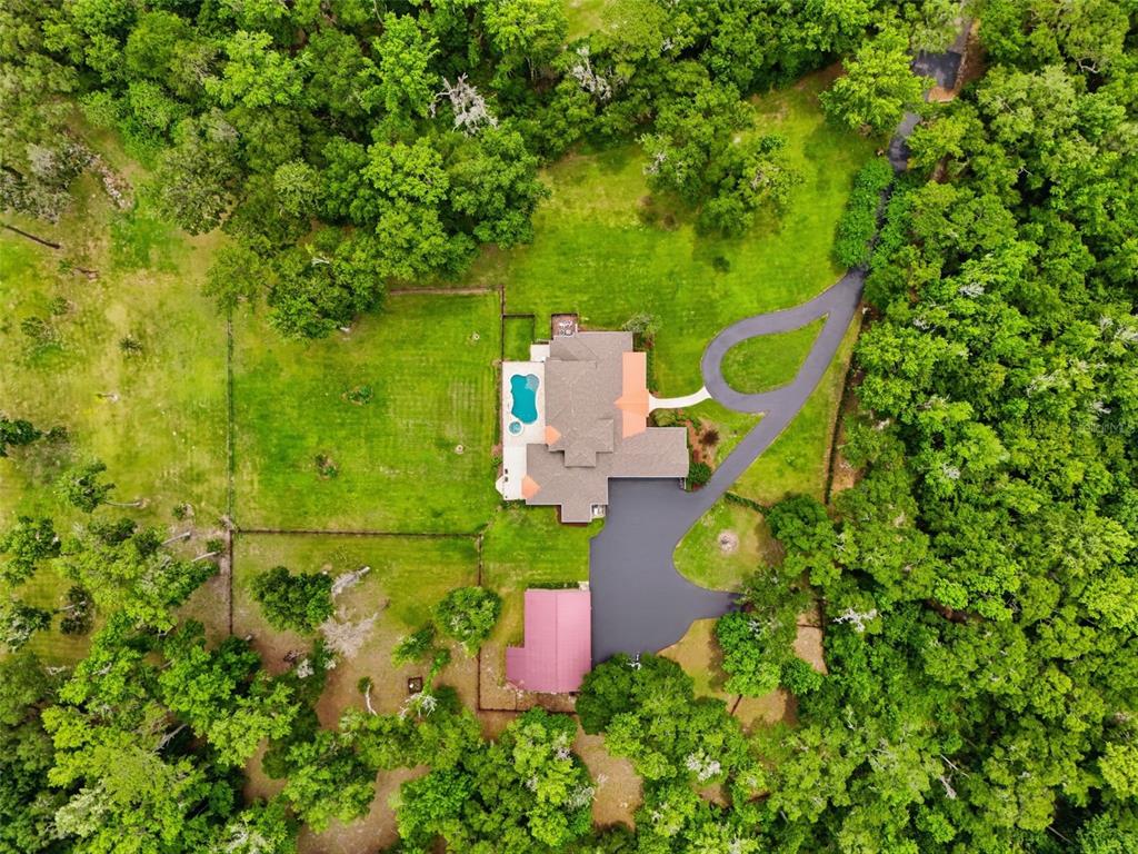 855 Southeast 87th Street Ocala, FL 34480 - Photo 68 of 79 an aerial view of a house with a yard