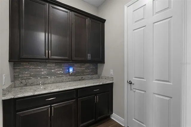 a bathroom with a shower and a toilet