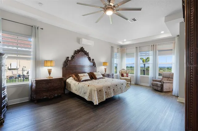 a spacious bathroom with a double vanity sink a mirror and a shower
