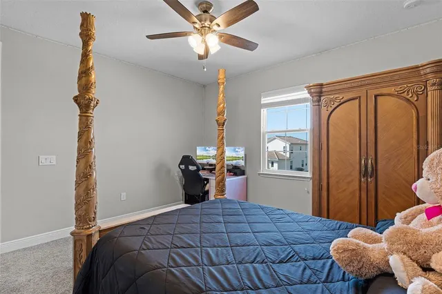 a front view of a house with a yard table and chairs
