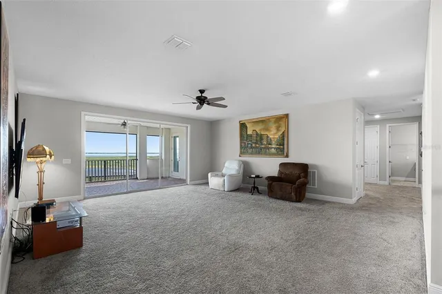 an aerial view of residential houses with outdoor space and swimming pool