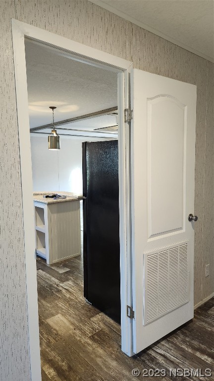 6262 Cherry Lane Bunnell, FL 32110 - Photo 12 of 41 a view of a refrigerator in kitchen and an empty room