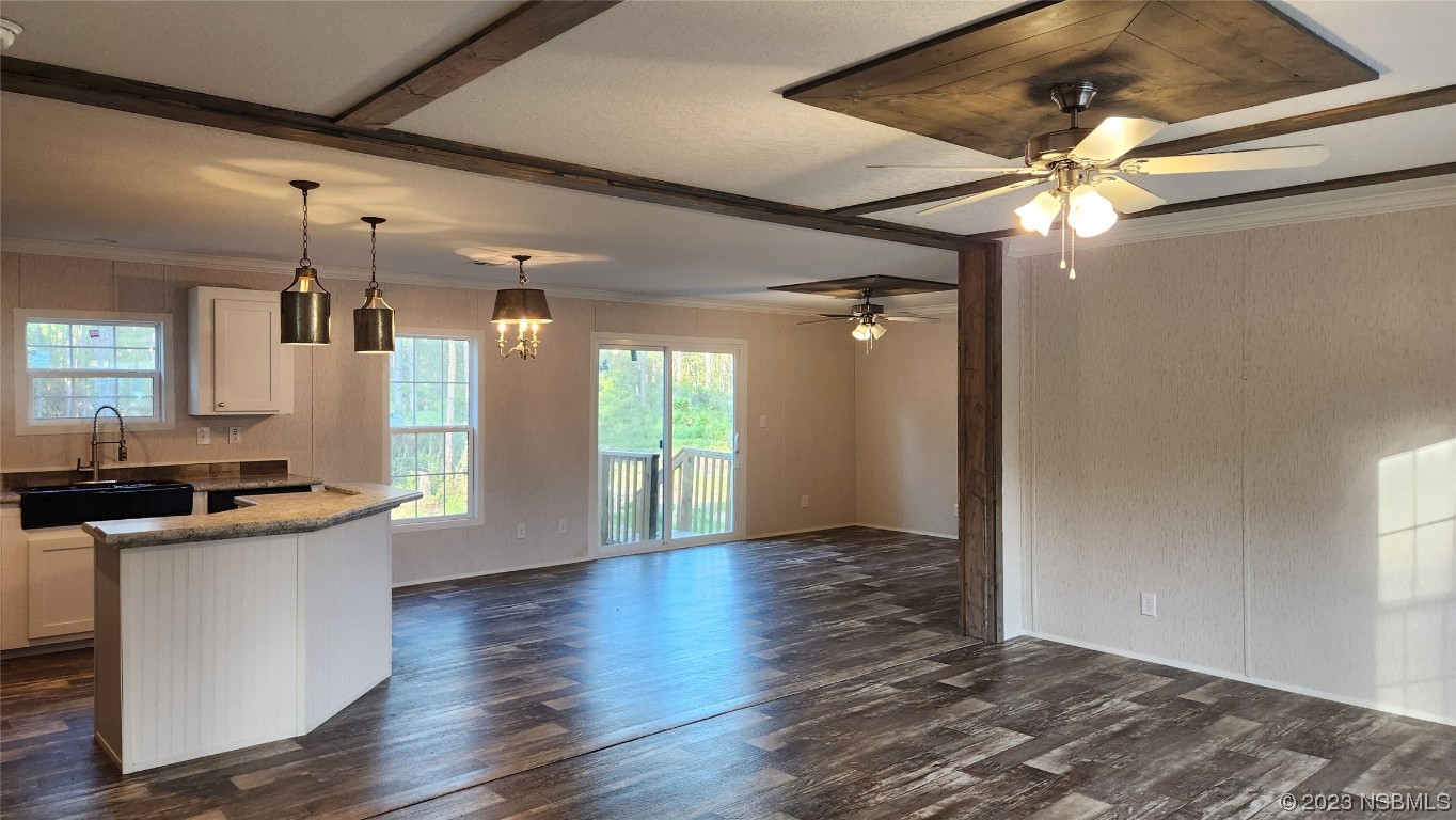 6262 Cherry Lane Bunnell, FL 32110 - Photo 2 of 41 wooden floor in an empty room with a window
