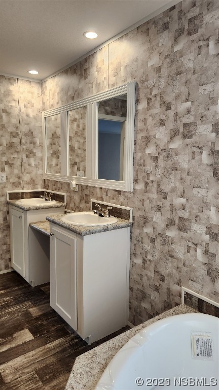 6262 Cherry Lane Bunnell, FL 32110 - Photo 33 of 41 a bathroom with a sink and a mirror