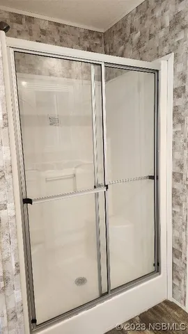 a view of a park with large trees