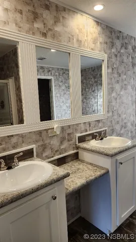 a view of yard with swimming pool and green space