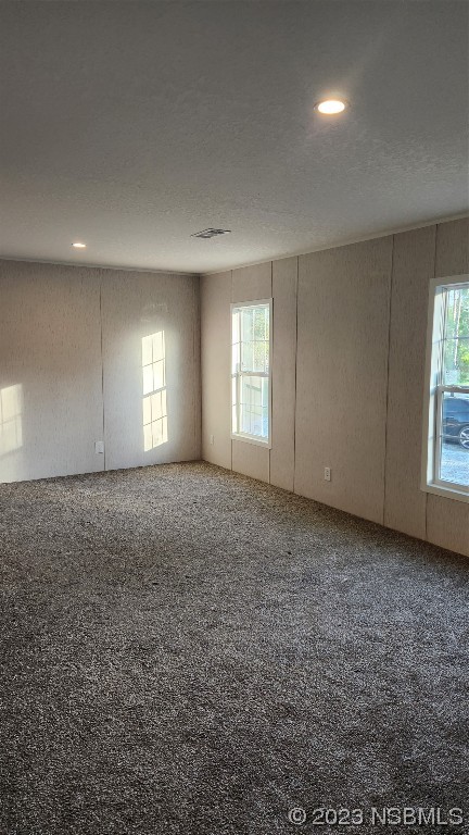 6262 Cherry Lane Bunnell, FL 32110 - Photo 36 of 41 an empty room with windows and closet