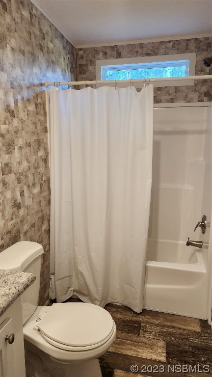6262 Cherry Lane Bunnell, FL 32110 - Photo 5 of 41 a bathroom with a toilet and a shower curtain
