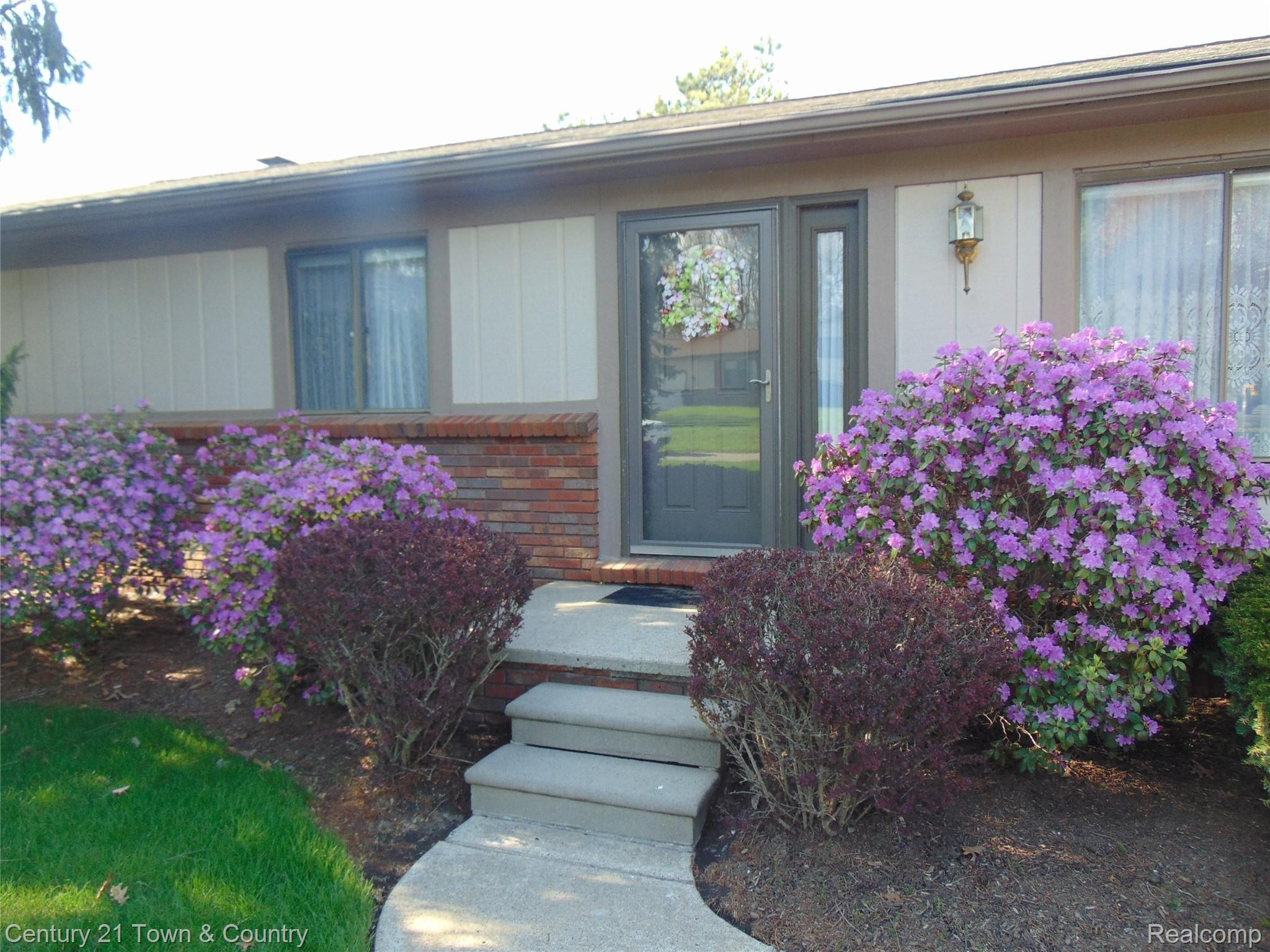 9555 Ridge Top Trail Clarkston, MI 48348 - Photo 2 of 49 Front Entry with Beautiful Azaleas.....
