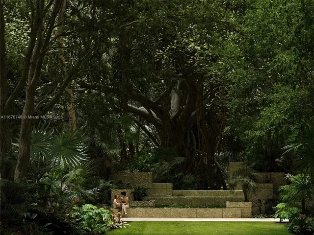 a view of backyard with green space