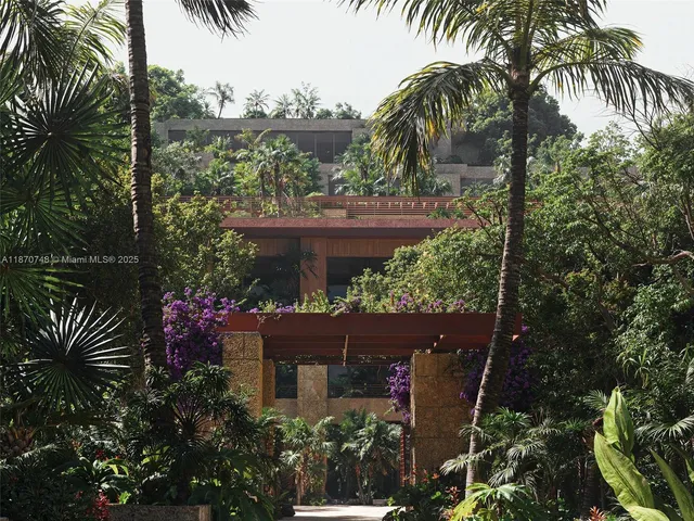 front view of a house with a garden