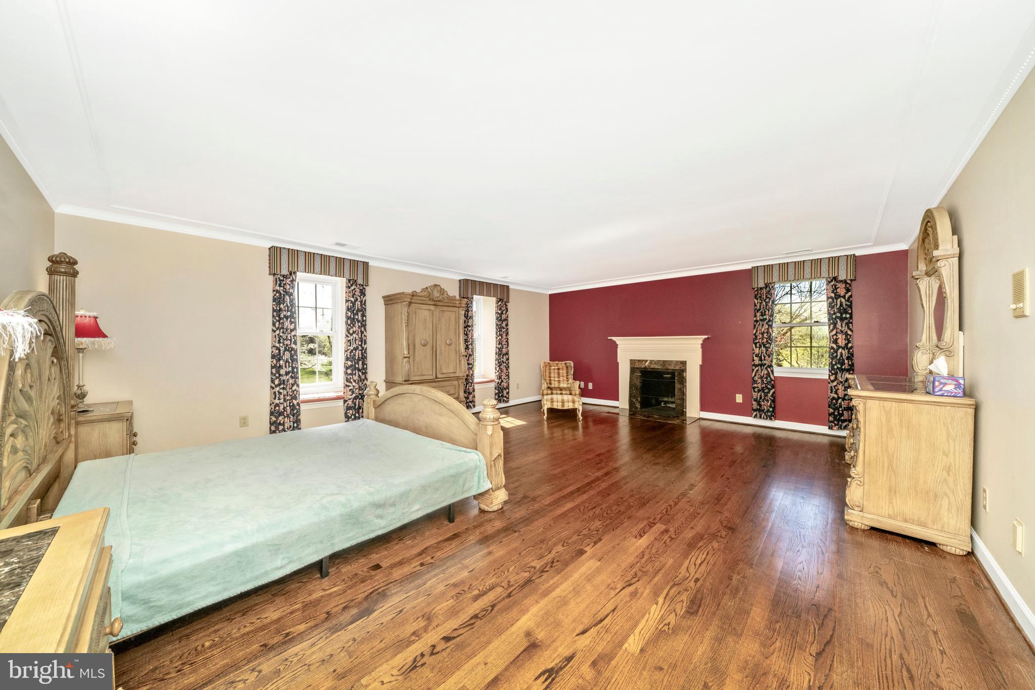 12929 Esworthy Road North Potomac, MD 20878 - Photo 19 of 42 Primary bedroom w Fireplace