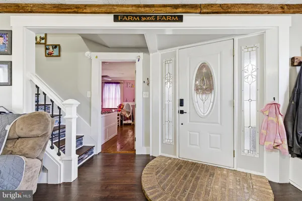 a view of kitchen and dining room with wooden floor