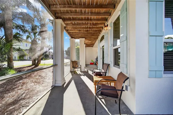 a view of a livingroom with furniture and hardwood floor