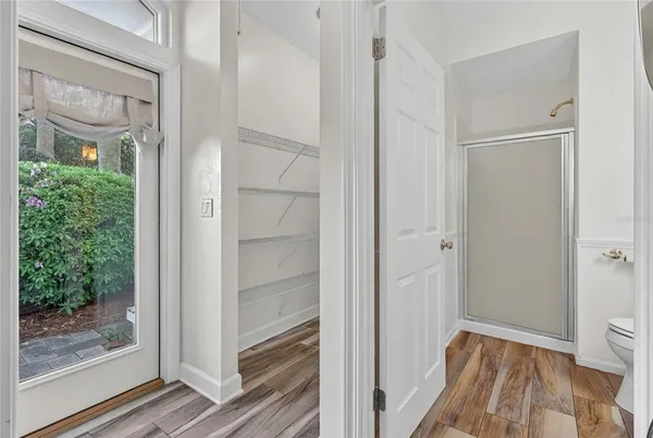 a view of a livingroom with furniture and a flat screen tv