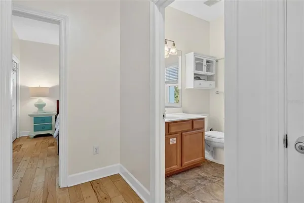 a view of a dinning room with a dinning table and chairs