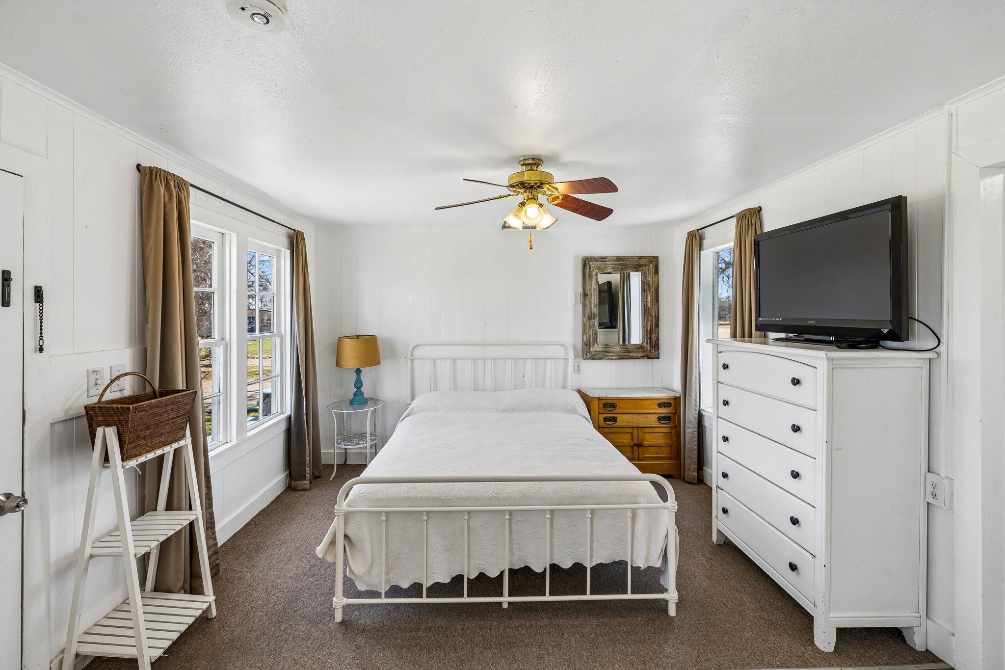 16838 Rm 2241 Tow, TX 78672 - Photo 18 of 30 a living room with furniture and a flat screen tv