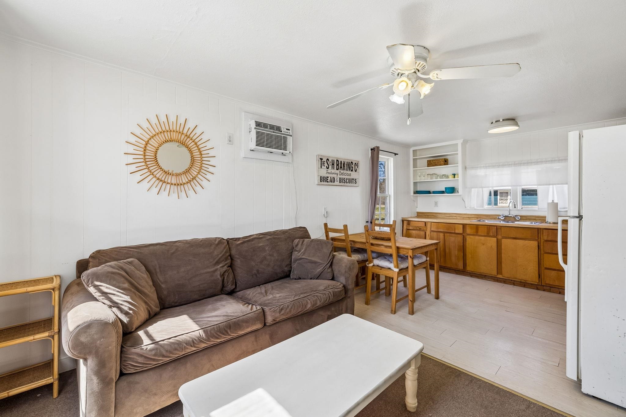 16838 Rm 2241 Tow, TX 78672 - Photo 21 of 30 a living room with furniture kitchen view and a chandelier