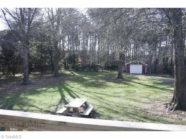 8075 Haw River Road Stokesdale, NC 27310 - Photo 4 of 9 Other. View of back yard from new deck