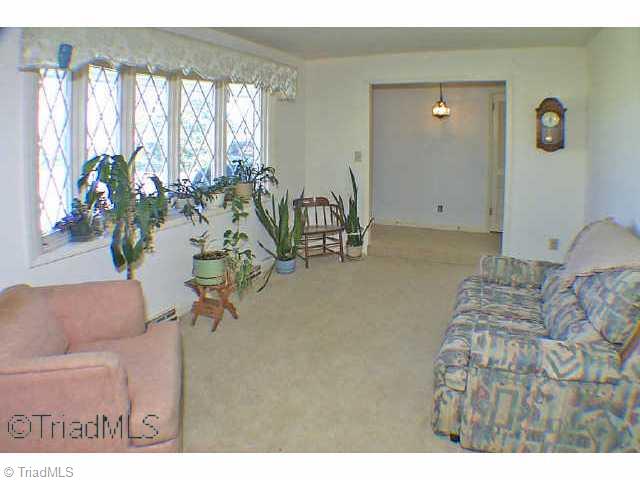 8075 Haw River Road Stokesdale, NC 27310 - Photo 7 of 9 Other. Living room as viewed from dining area
