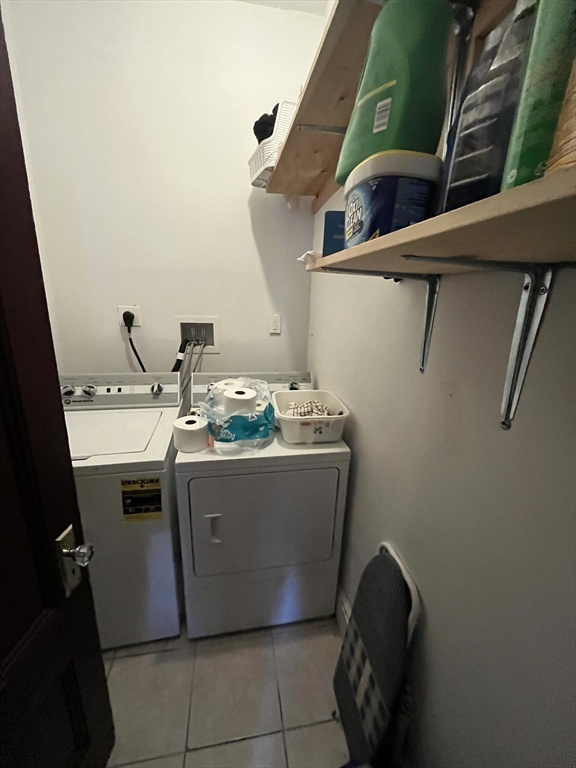 142 St Alphonsus Street, Unit 3 Boston, MA 02120 - Photo 12 of 13 a view of washer and dryer