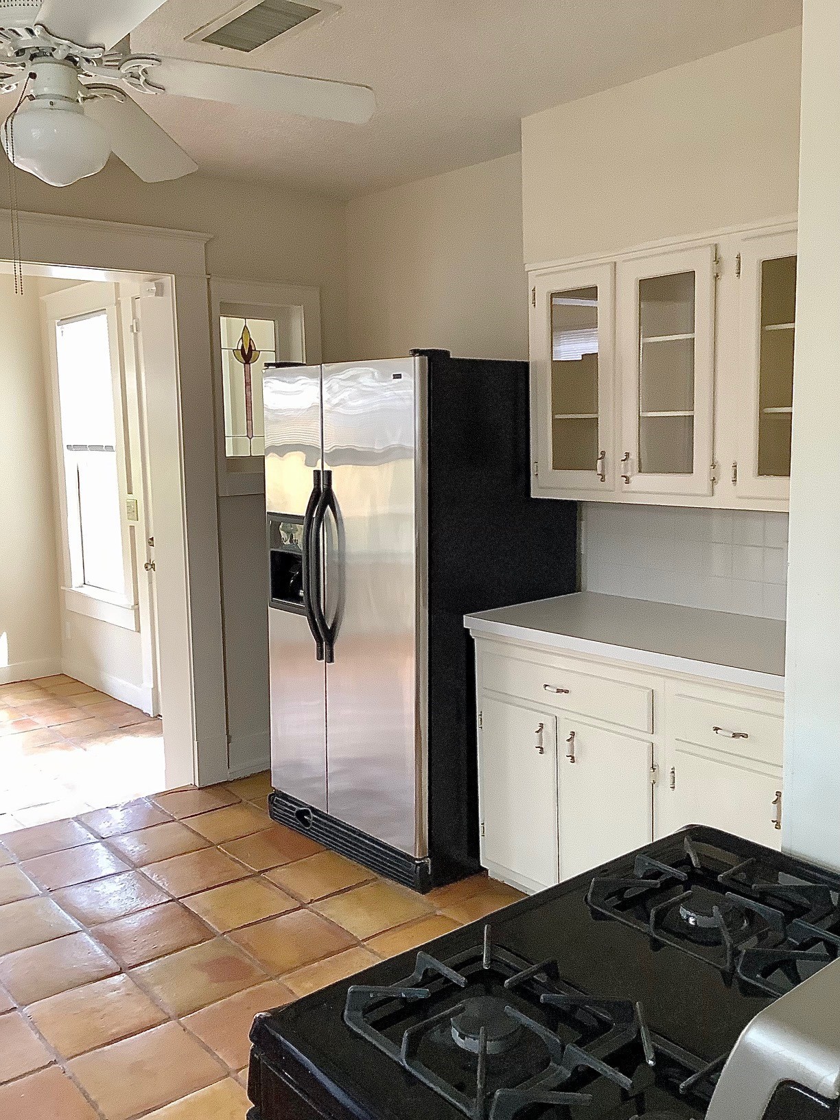 1322 Harvard Street Houston, TX 77008 - Photo 9 of 19 Lots of cabinet space along with good counter area for everyday cooking. Refrigerator included.