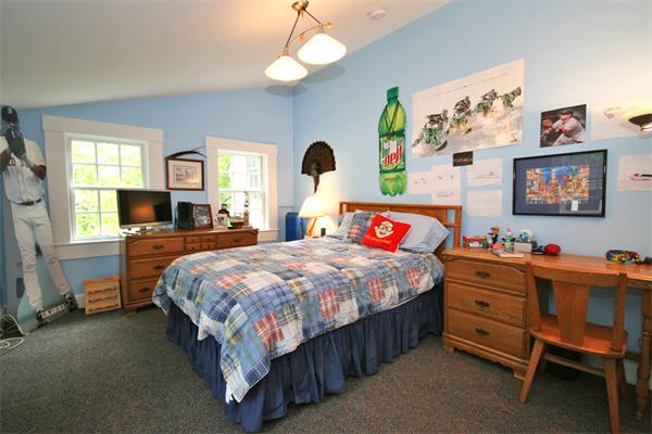 52 Salem Street Andover, MA 01810 - Photo 11 of 21 a bed room with a bed and a tv on dresser