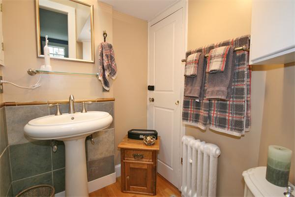 52 Salem Street Andover, MA 01810 - Photo 17 of 21 a bathroom with a sink toilet and shower
