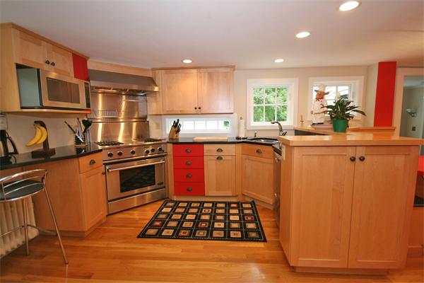 52 Salem Street Andover, MA 01810 - Photo 3 of 21 a kitchen with granite countertop a stove and a refrigerator