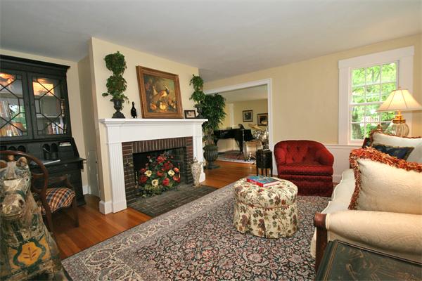 52 Salem Street Andover, MA 01810 - Photo 4 of 21 a living room with furniture and a fireplace