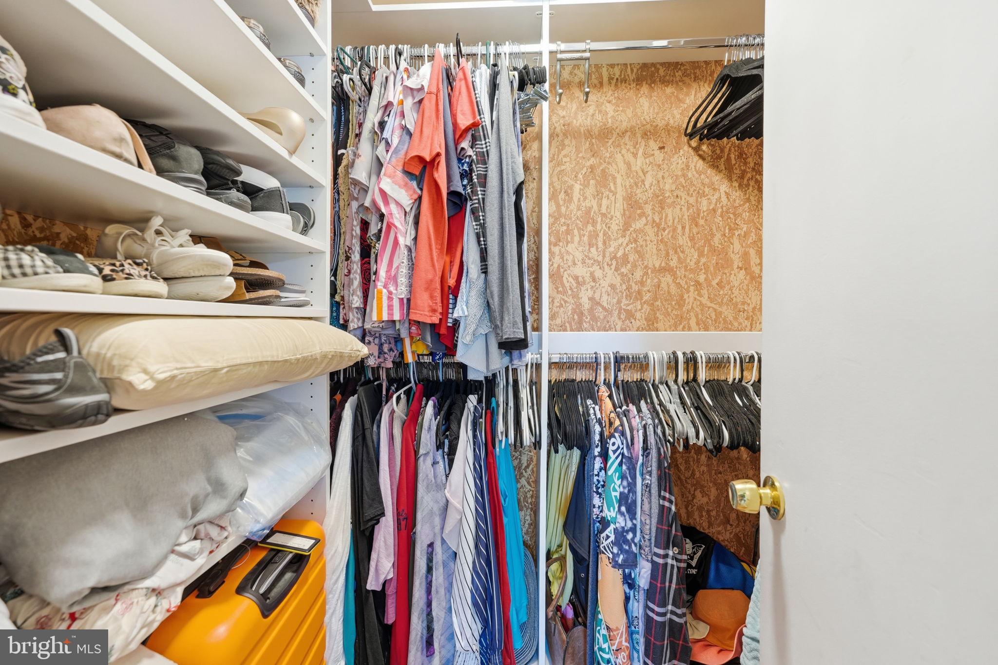 906 Wingfield Road Woodbridge, VA 22191 - Photo 20 of 31 Organized closet with vibrant attire.